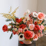 Warm sunset-toned flower arrangement with seasonal blooms – Adore Floral NYC
